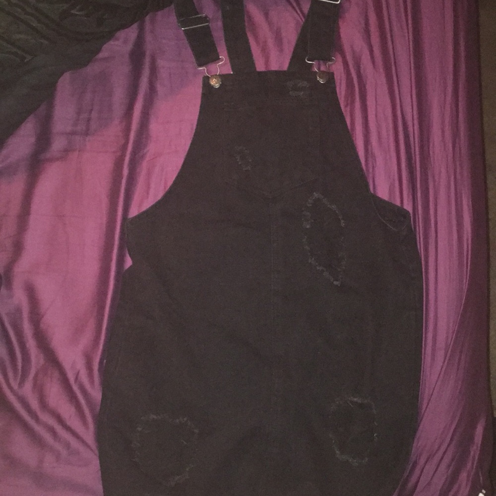 Black ripped overalls